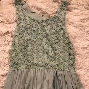 Mini dress with maxi overlay